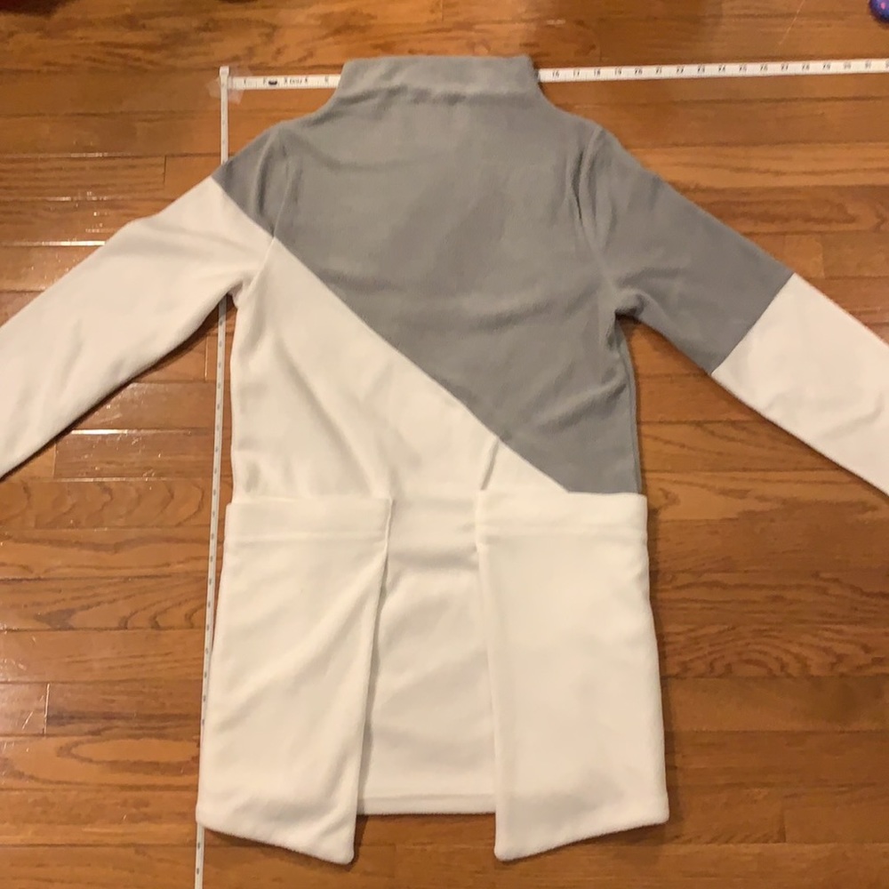 Unique dress, an asymmetrical symmetry, large pockets and a mock turtleneck!